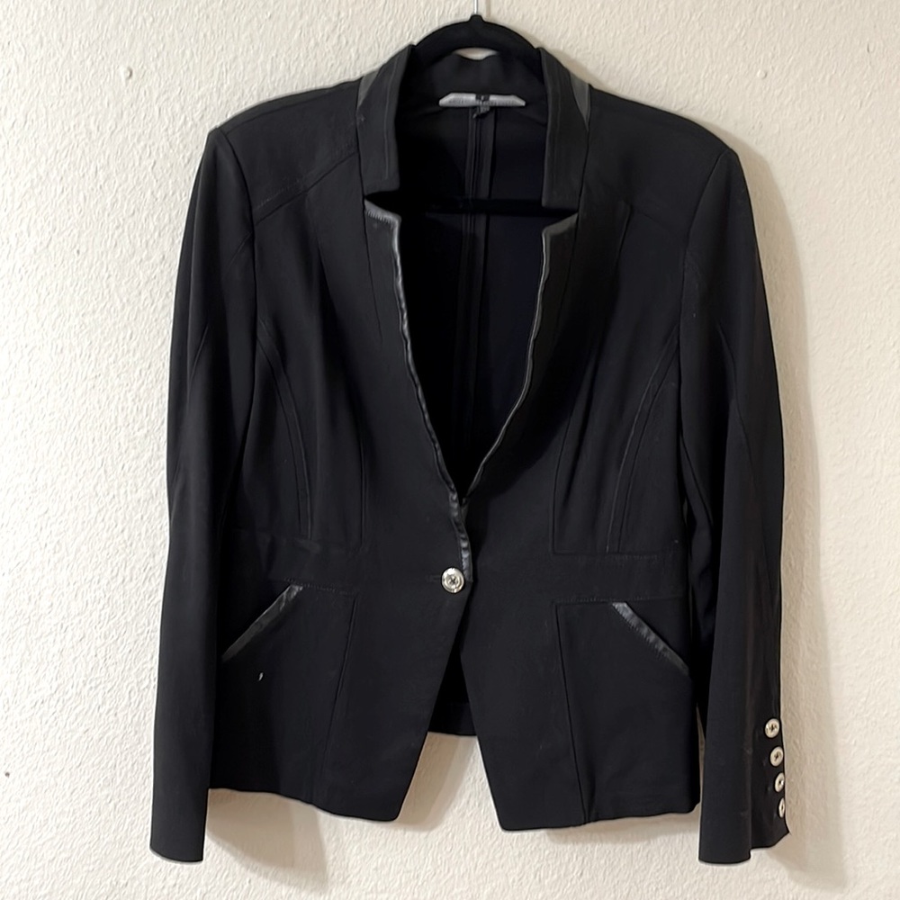 Faux leather lined. Stretchy material